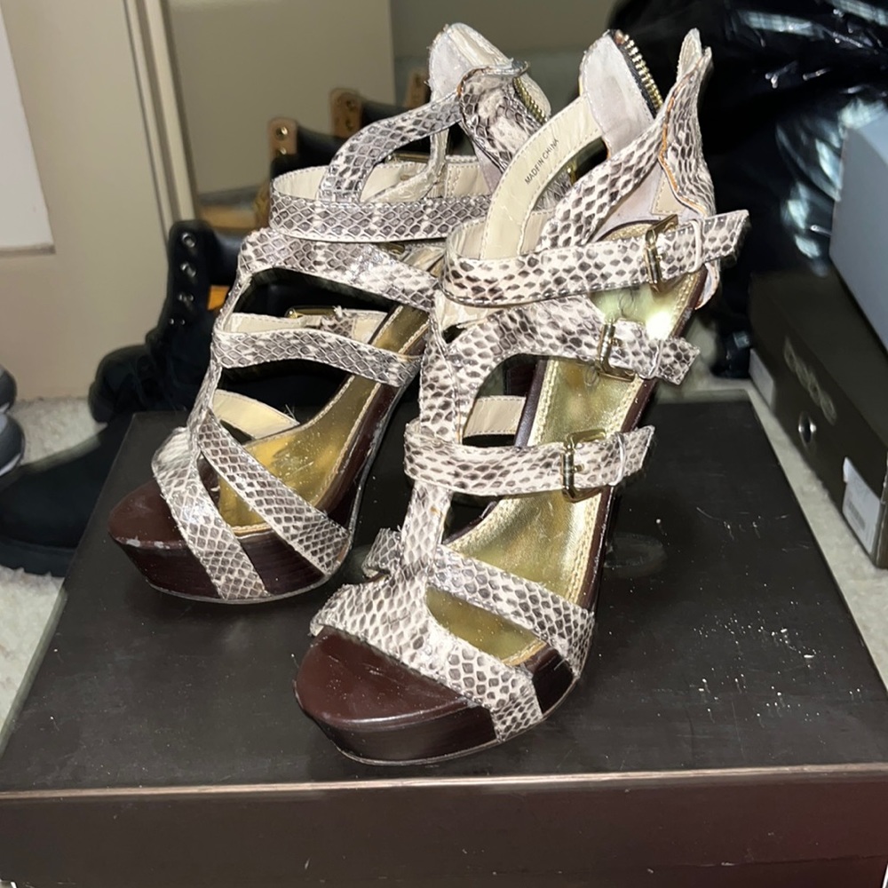 Bebe snake skin heels are for sale